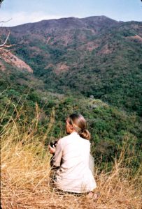 Jane Goodall on the Peak at Gombe, her favorite site from which to watch chimpanzees, taken in 1988. (Photo used with permission of Géza Telecki and Dale Peterson.)